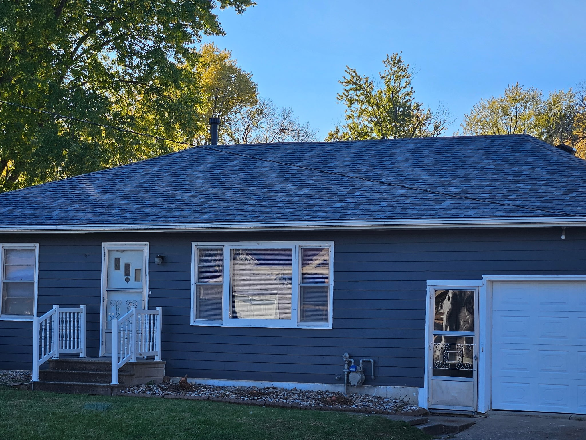 Blue house roof replacement Ottumwa Iowa