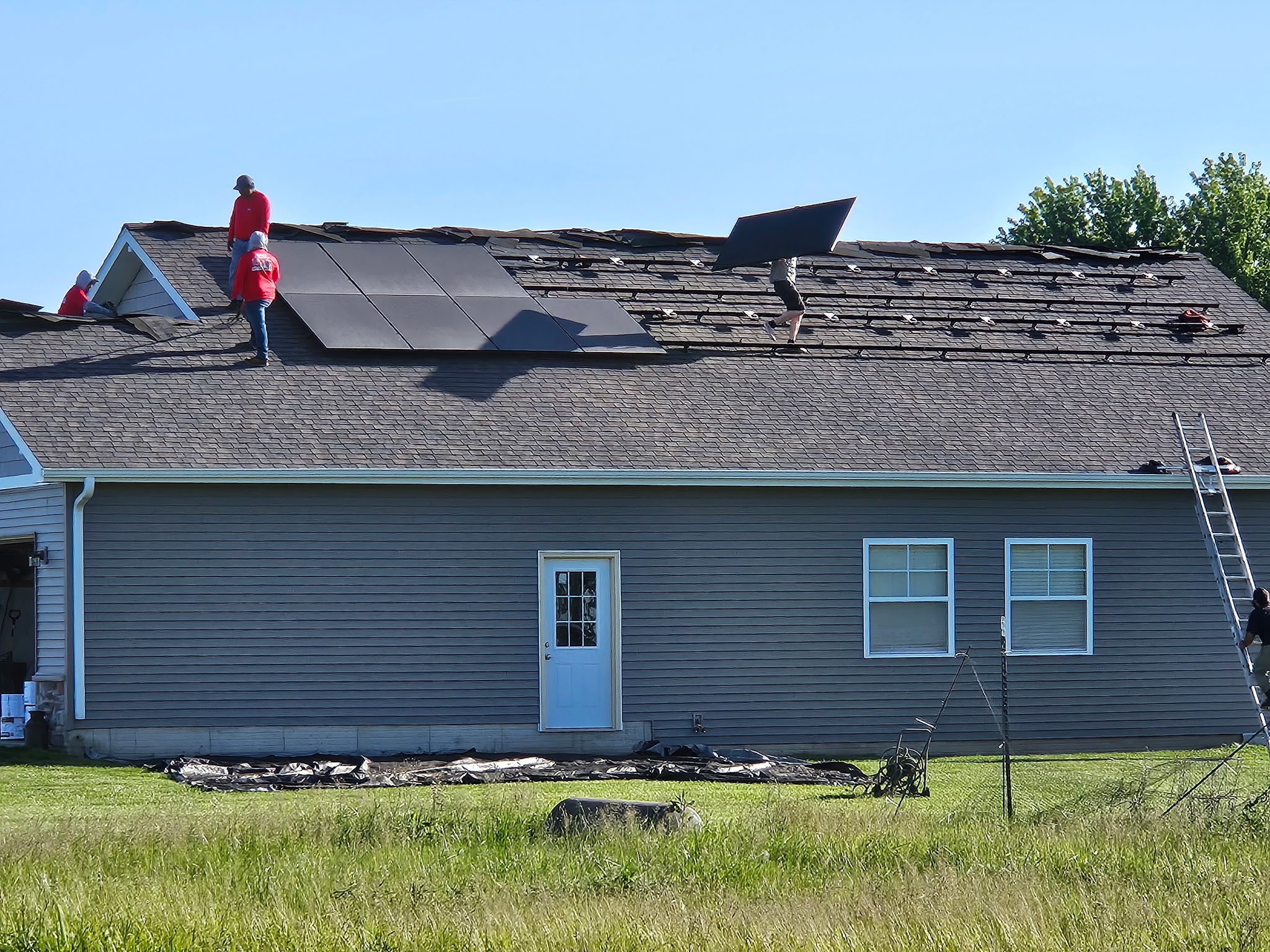 B&C Roofing removing solar panels before new roof